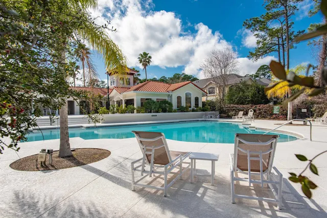 a view of a fountain with a fountain in the yard
