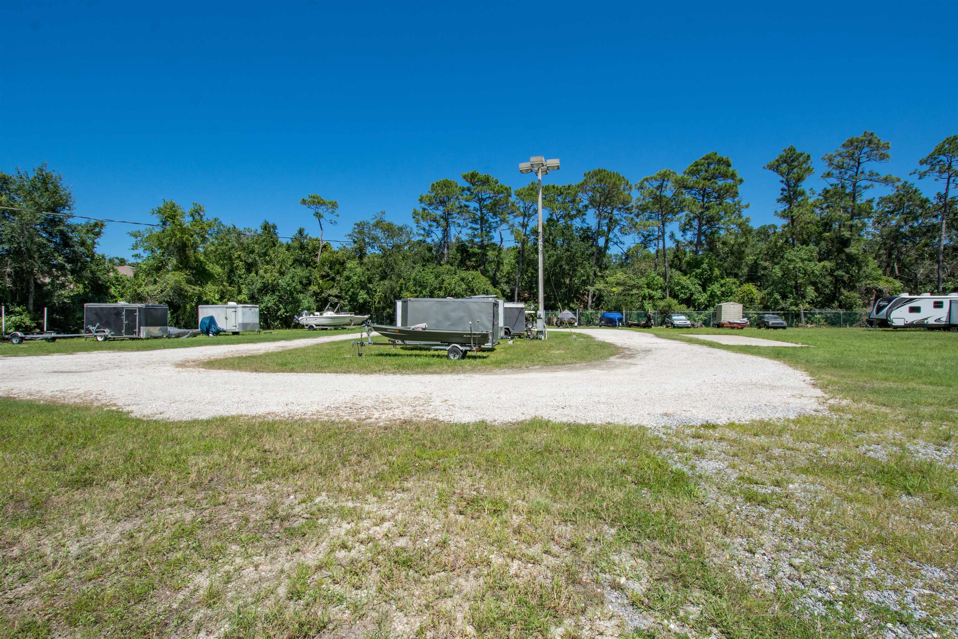 2202 Vista Cove Road St. Augustine, FL 32084 - Photo 33 of 38 a view of a swimming pool with a yard