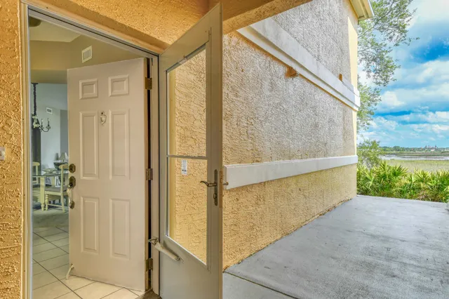 a view of a porch with seating space