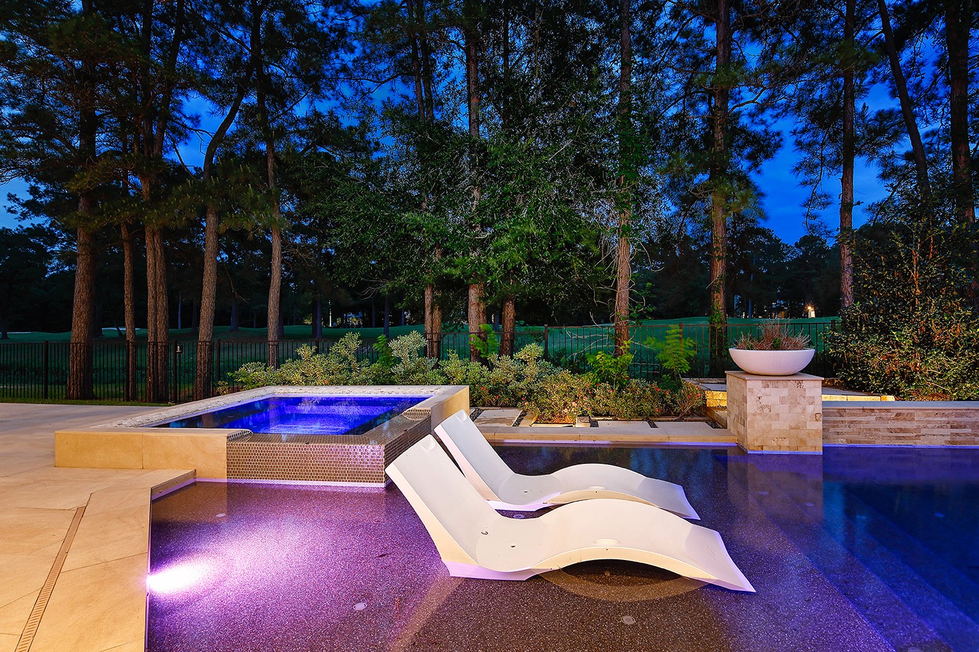 70 Quail Rock Place The Woodlands, TX 77381 - Photo 39 of 46 a view of a patio with swimming pool