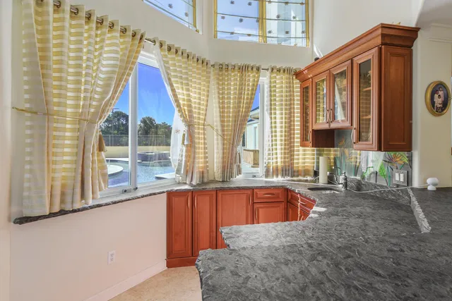 a view of a living room and window