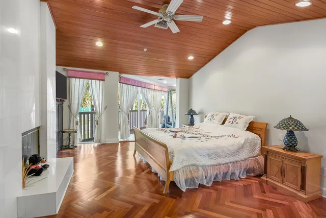 a bedroom with furniture and a window