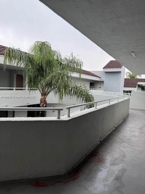 8335 Southwest 152nd Avenue, Unit PH2 Miami, FL 33193 - Photo 18 of 19 a view of outdoor space and yard