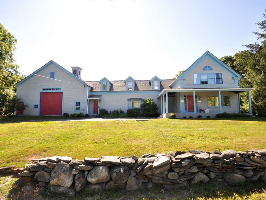 1024 Liberty Square Road Boxborough, MA 01719 - Photo 1 of 24 a front view of a house with swimming pool and ocean view