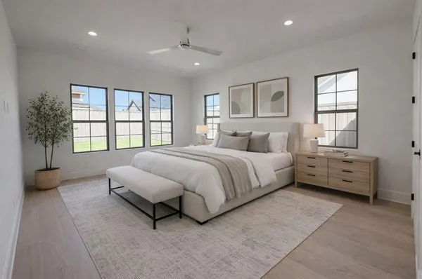 a bed room with a bed and a couch