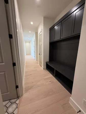 a view of entryway with wooden floor
