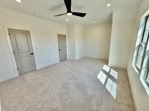 en empty room with windows