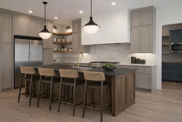 a kitchen with a table chairs refrigerator and microwave