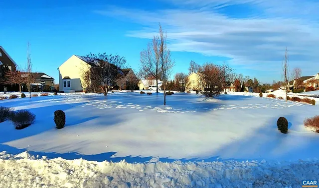 a living room with furniture gym equipment and a flat screen tv