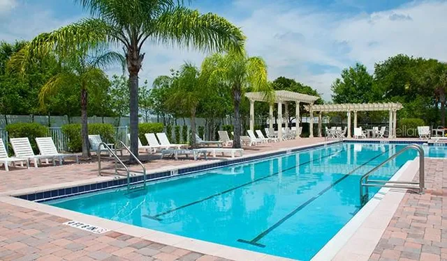 a view of a swimming pool with a garden