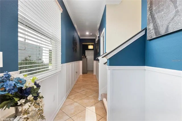 a view of a stairs and an main door