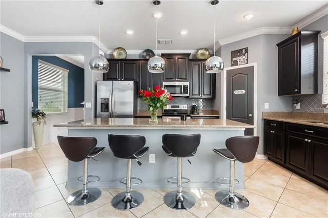 a kitchen with living room and living room