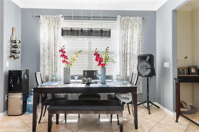 a table that has a couch and a stove in it