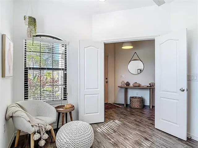 a living room with furniture and a window