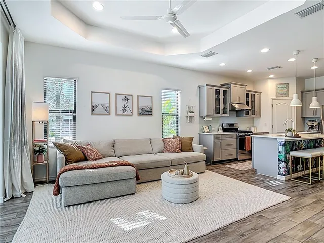 a bedroom with a bed and a couch