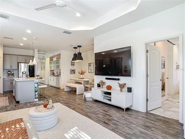 a bathroom with a toilet a sink and a mirror