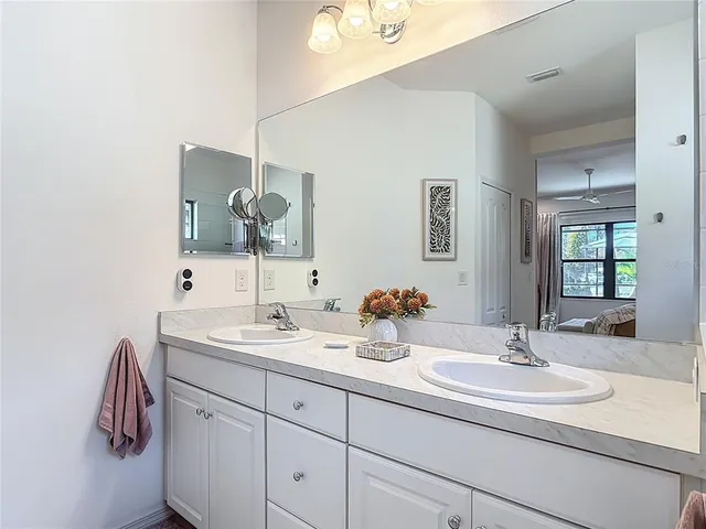 a view of a city with mountains in the background