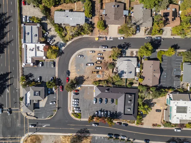 an aerial view of a city with lots of residential buildings