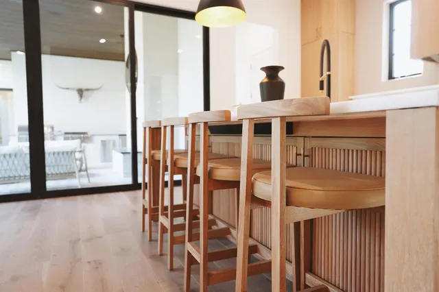 a view of a livingroom with furniture and entryway