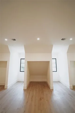 a bathroom with a bathtub and a sink