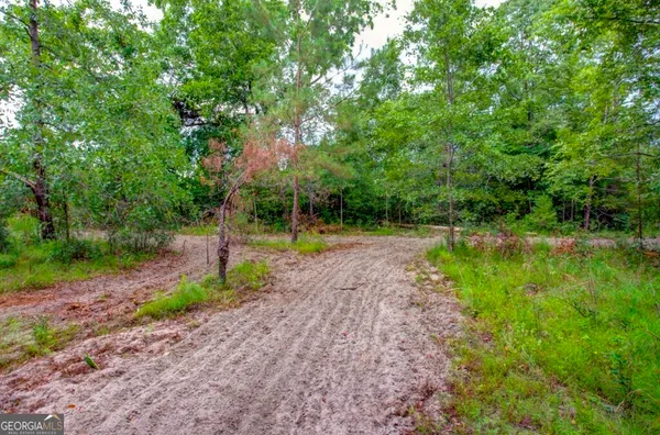 a view of swimming pool with an outdoor space and seating area