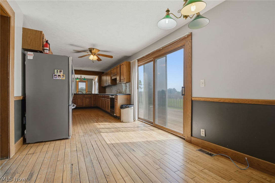 11513 Kile Road Chardon, OH 44024 - Photo 14 of 48 Kitchen with sliding door to deck