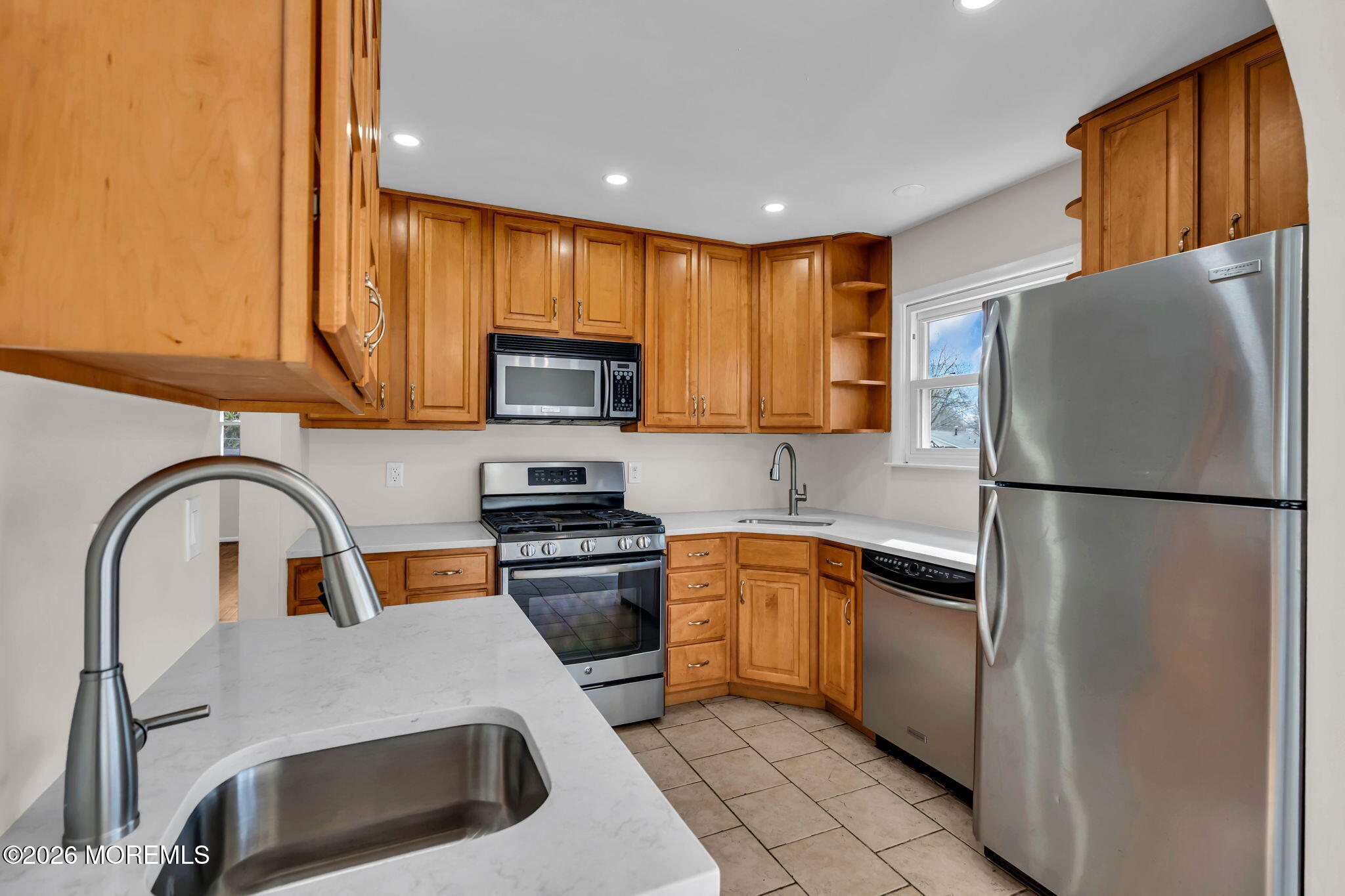 7 Spruce Terrace Jackson, NJ 08527 - Photo 15 of 49 a kitchen with stainless steel appliances granite countertop a refrigerator a stove top oven a sink and dishwasher