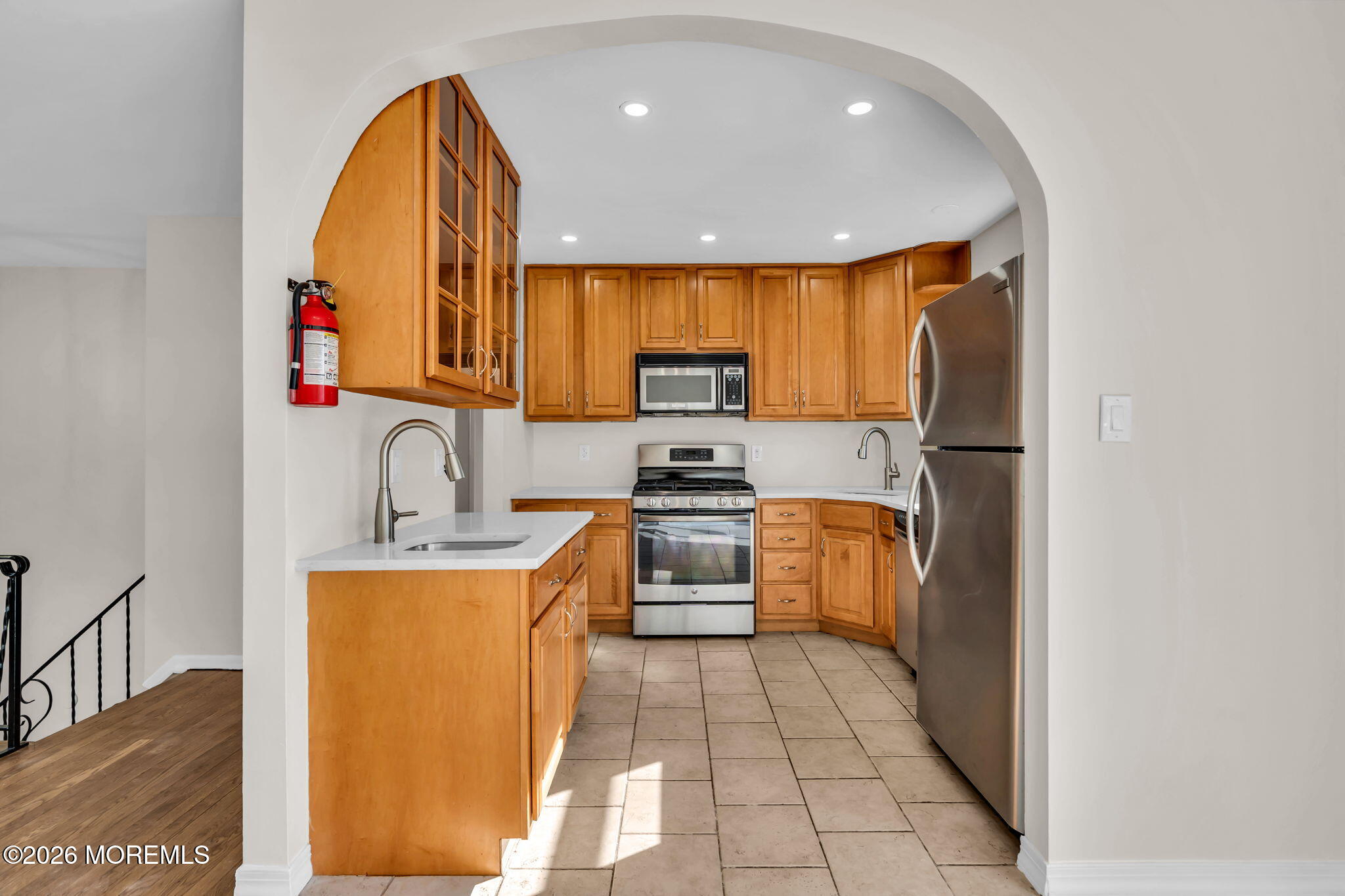 7 Spruce Terrace Jackson, NJ 08527 - Photo 18 of 49 a kitchen with stainless steel appliances granite countertop a sink and a stove