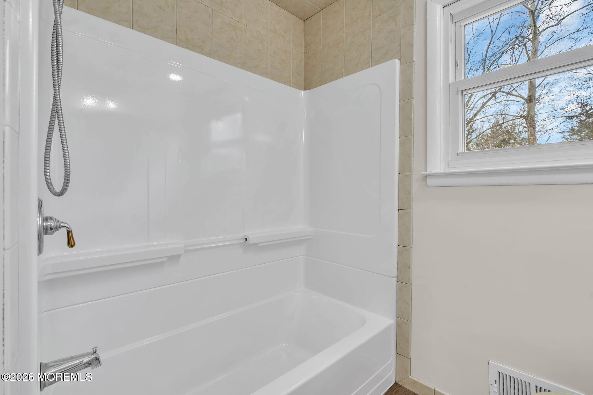 7 Spruce Terrace Jackson, NJ 08527 - Photo 28 of 49 a bathroom with a bathtub and a shower