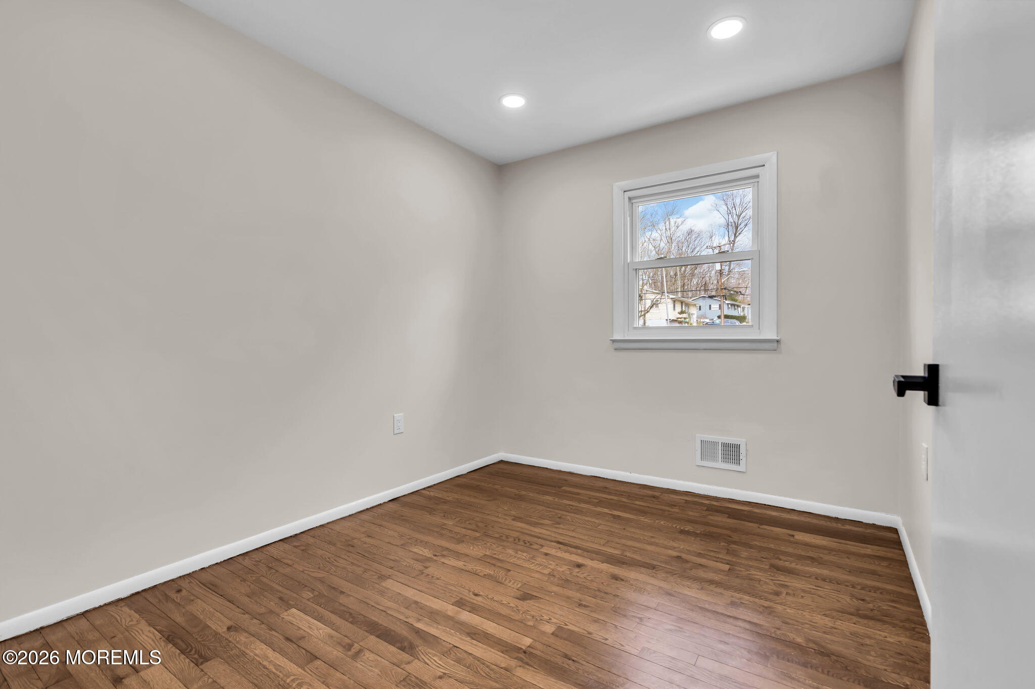 7 Spruce Terrace Jackson, NJ 08527 - Photo 29 of 49 a view of empty room with wooden floor