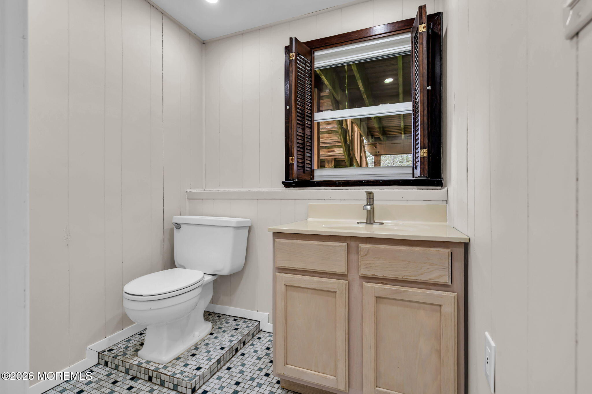7 Spruce Terrace Jackson, NJ 08527 - Photo 36 of 49 a bathroom with a toilet a sink and mirror