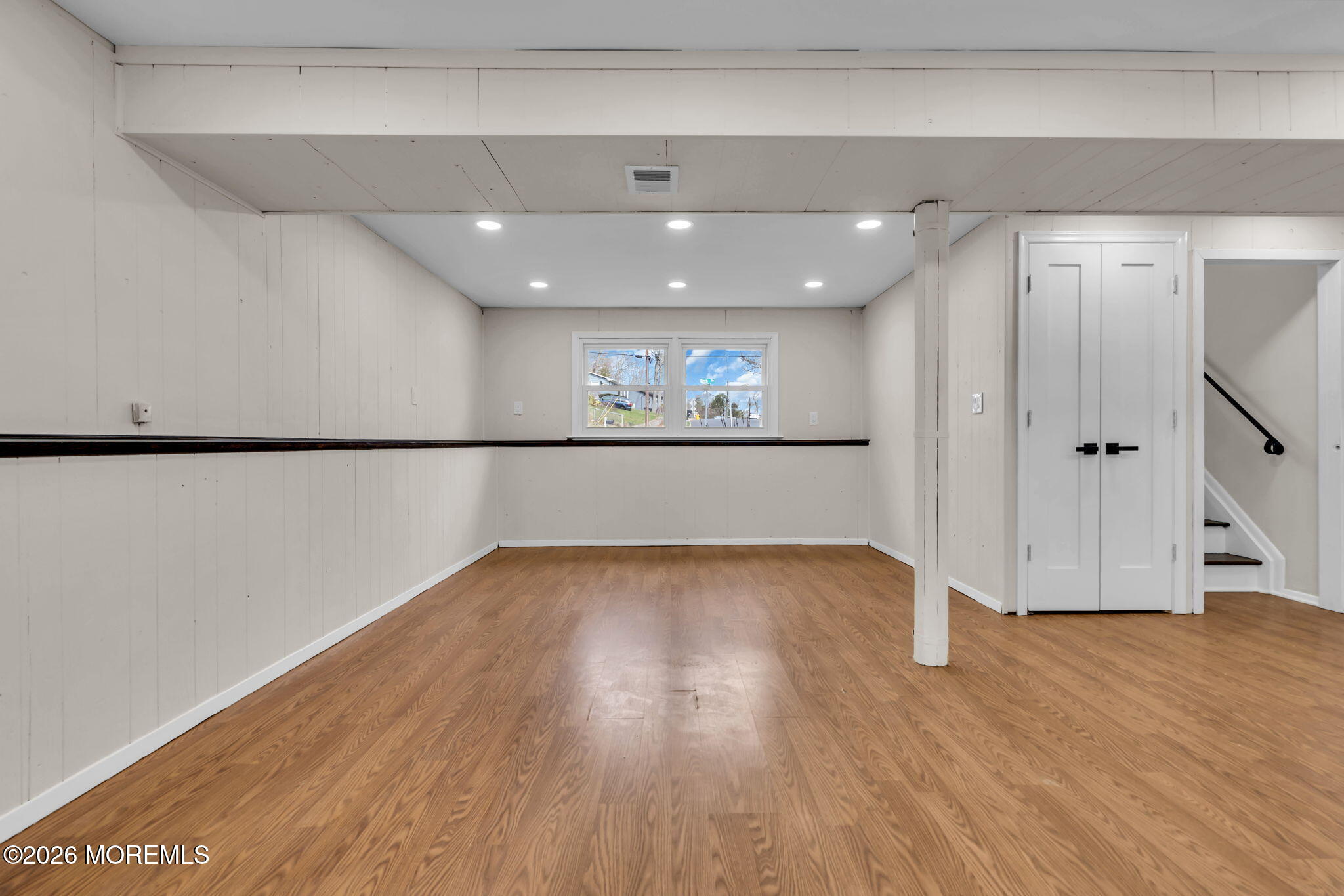 7 Spruce Terrace Jackson, NJ 08527 - Photo 42 of 49 a view of an empty room with wooden floor