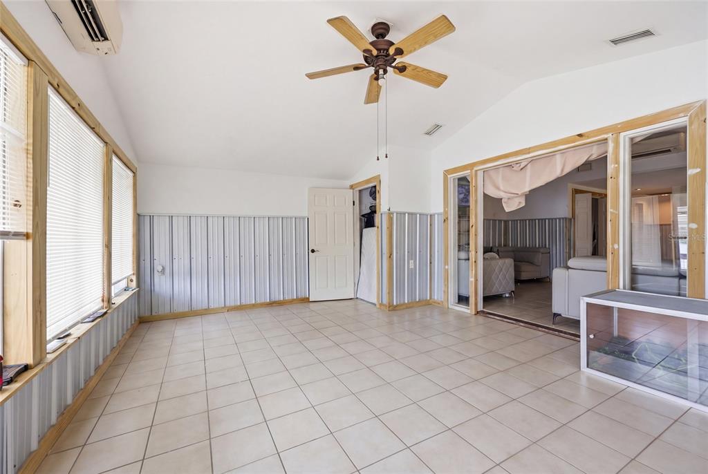 505 3rd Street Cedar Key, FL 32625 - Photo 12 of 37 a view of an empty room with a window