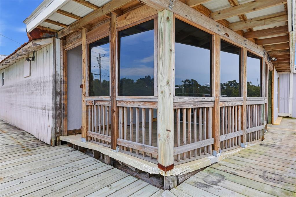 505 3rd Street Cedar Key, FL 32625 - Photo 25 of 37 a view of a wooden deck