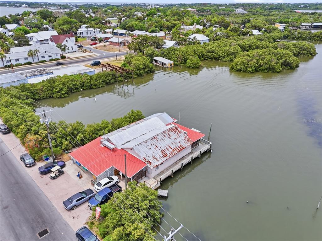 505 3rd Street Cedar Key, FL 32625 - Photo 34 of 37 an aerial view of a city with lake view