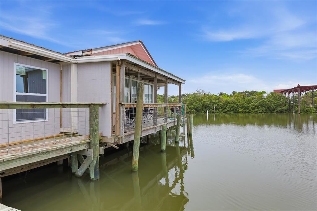 505 3rd Street Cedar Key, FL 32625 - Photo 35 of 37 a house with lake view