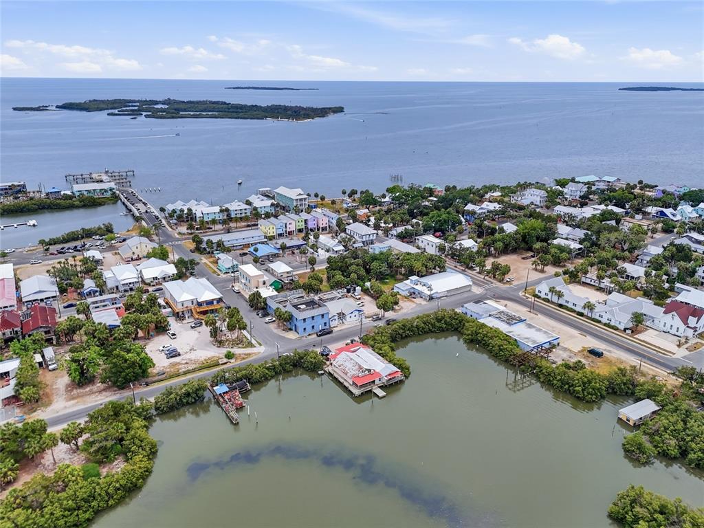 505 3rd Street Cedar Key, FL 32625 - Photo 5 of 37 an aerial view of a city