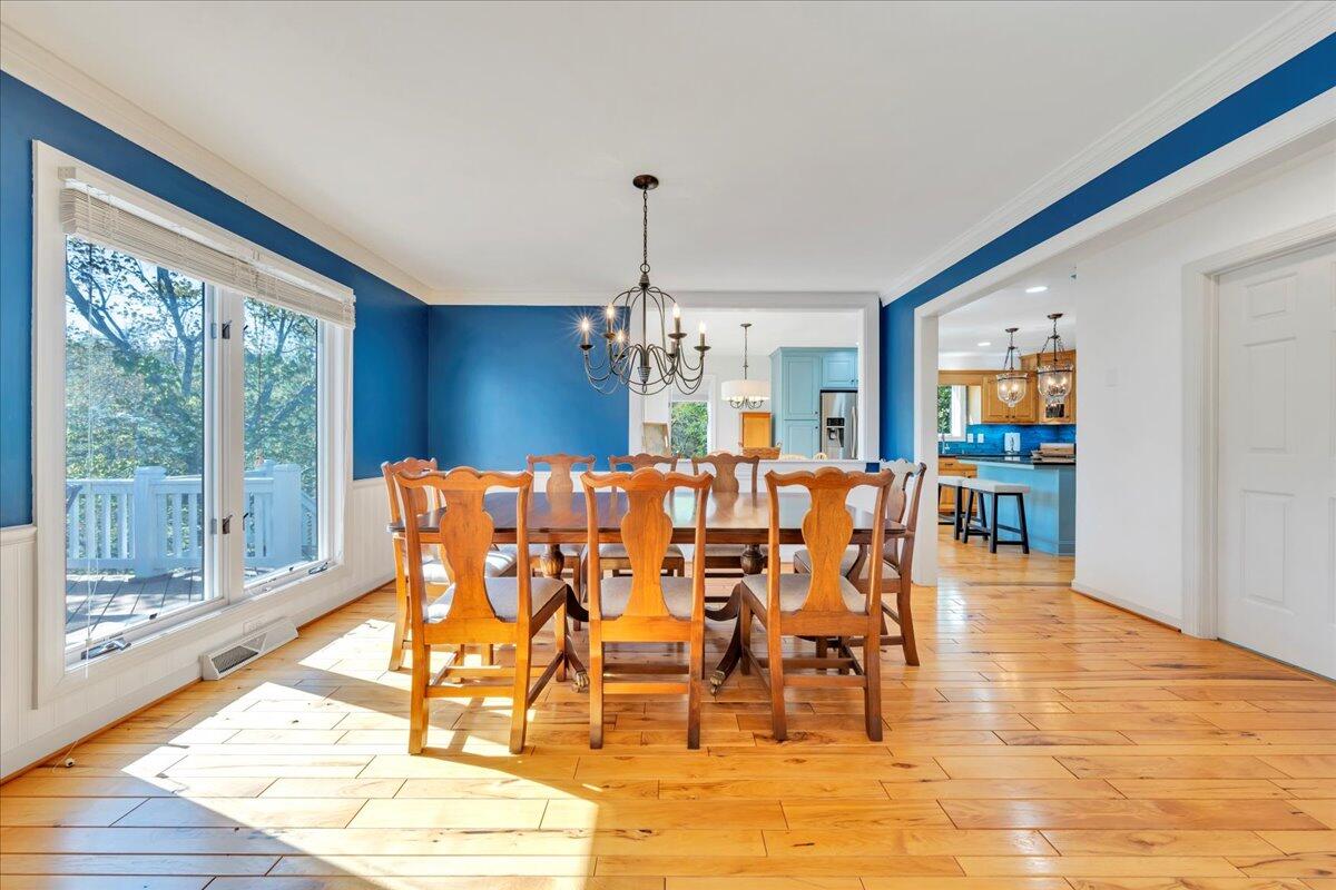 270 Forest Edge Road Wirtz, VA 24184 - Photo 14 of 79 a dining room with furniture window and wooden floor