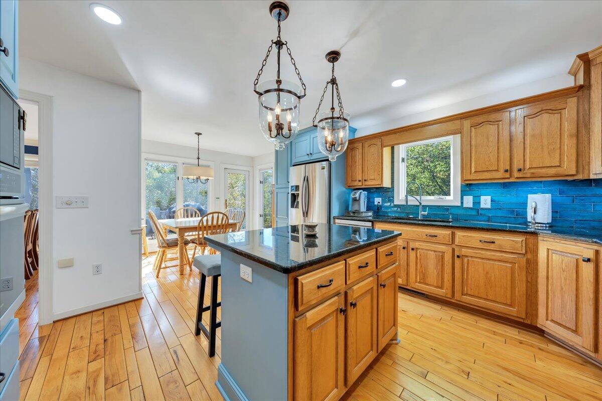 270 Forest Edge Road Wirtz, VA 24184 - Photo 20 of 79 a kitchen with stainless steel appliances granite countertop a sink a stove and refrigerator