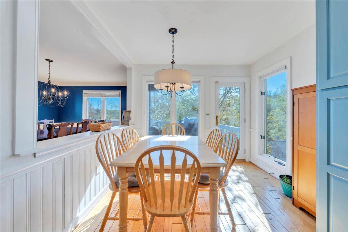 270 Forest Edge Road Wirtz, VA 24184 - Photo 22 of 79 a view of a dining room with furniture window and wooden floor
