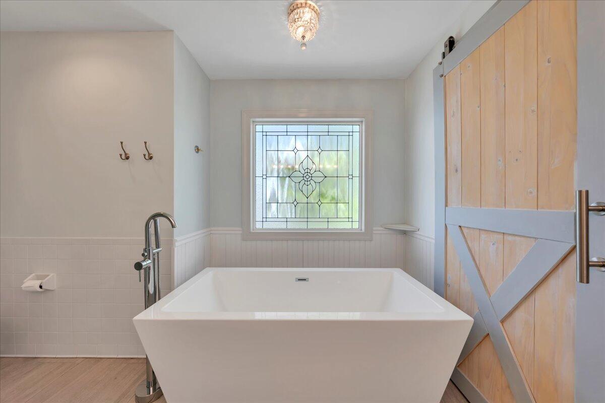 270 Forest Edge Road Wirtz, VA 24184 - Photo 30 of 79 a white bath tub sitting in a bathroom