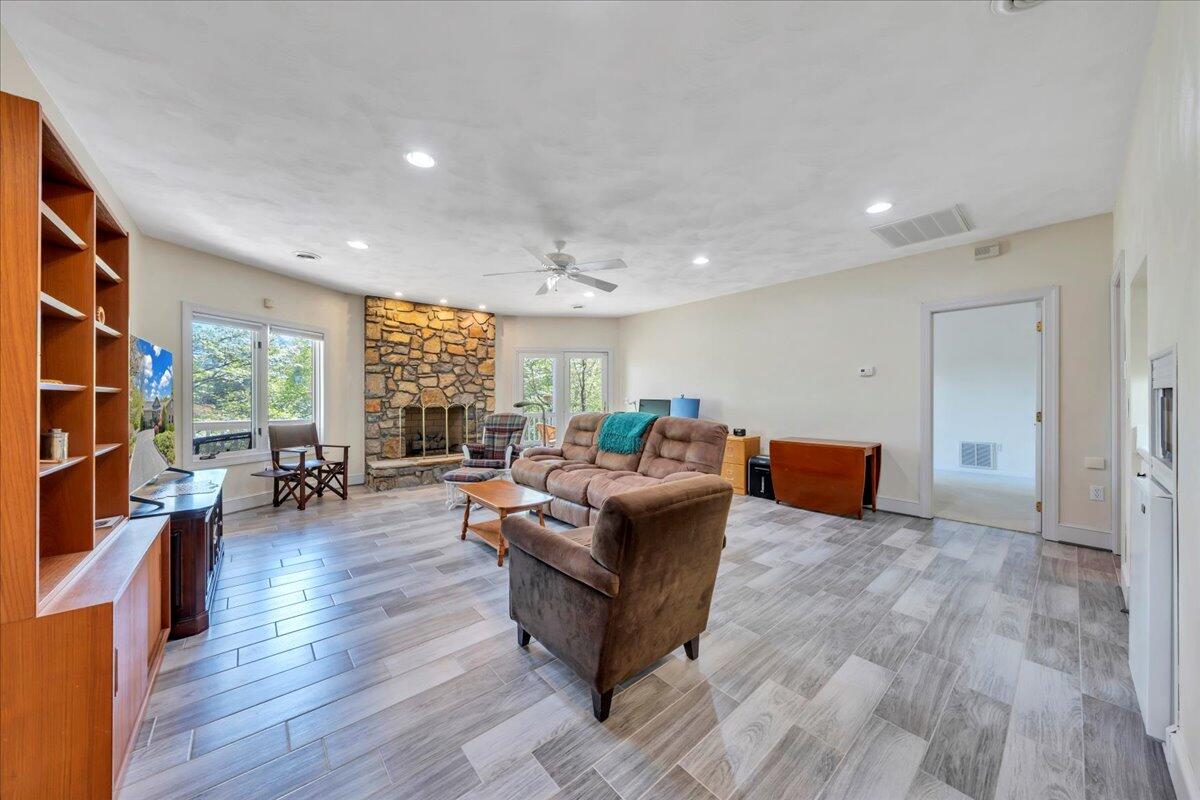 270 Forest Edge Road Wirtz, VA 24184 - Photo 35 of 79 a living room with furniture and a wooden floor
