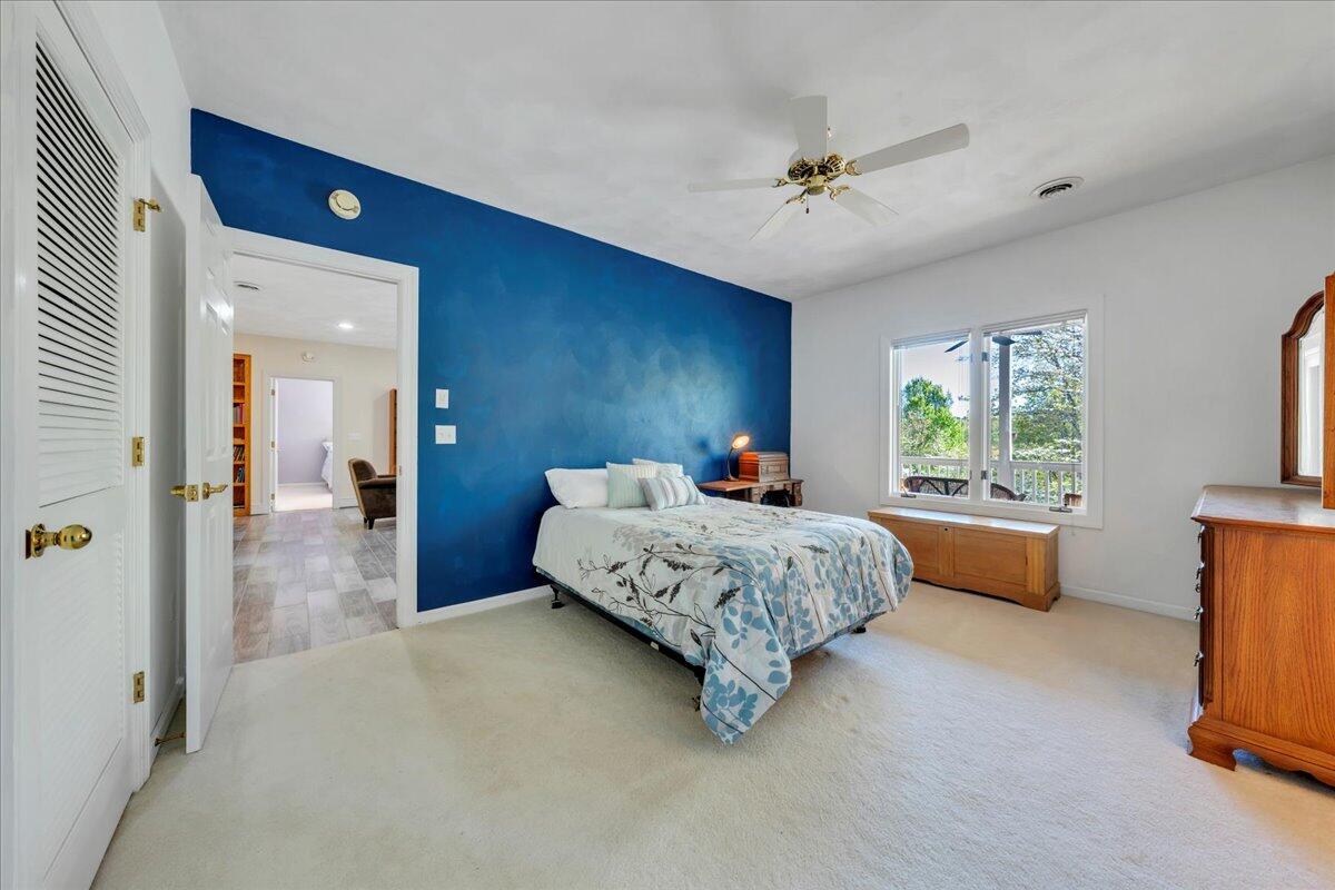 270 Forest Edge Road Wirtz, VA 24184 - Photo 38 of 79 a living room with a bed furniture and a window
