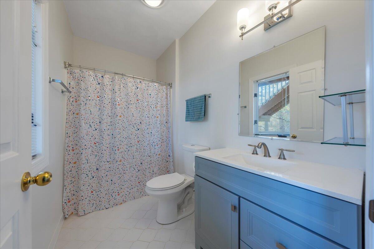 270 Forest Edge Road Wirtz, VA 24184 - Photo 40 of 79 a bathroom with a sink a toilet and shower