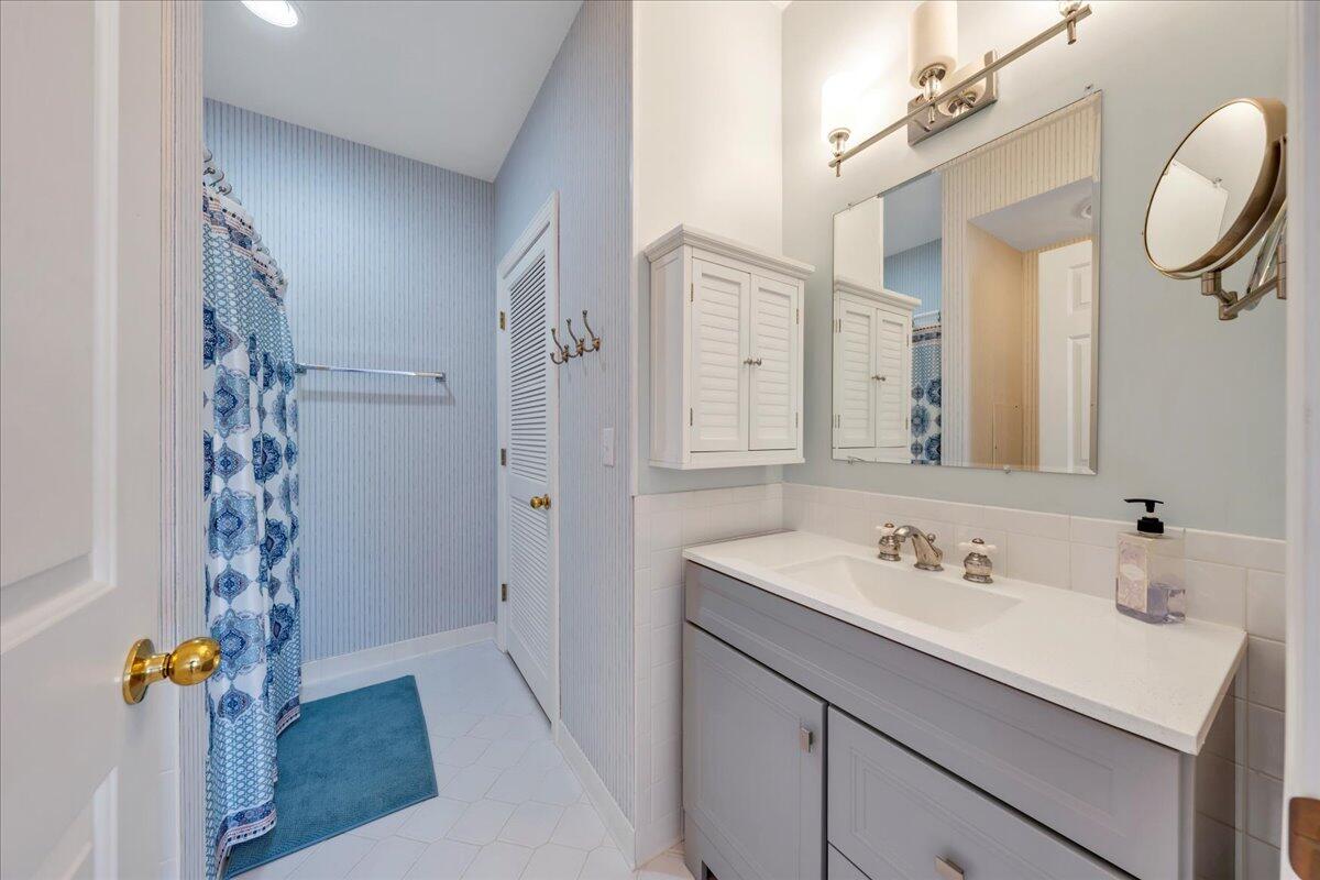 270 Forest Edge Road Wirtz, VA 24184 - Photo 43 of 79 a bathroom with a sink vanity granite and a mirror