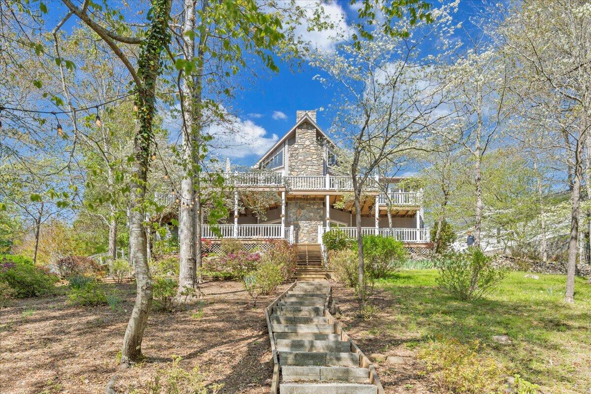 270 Forest Edge Road Wirtz, VA 24184 - Photo 5 of 79 a front view of a house with garden