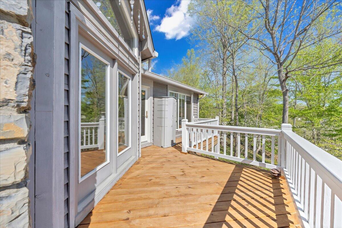 270 Forest Edge Road Wirtz, VA 24184 - Photo 53 of 79 a view of a balcony with wooden floor and fence