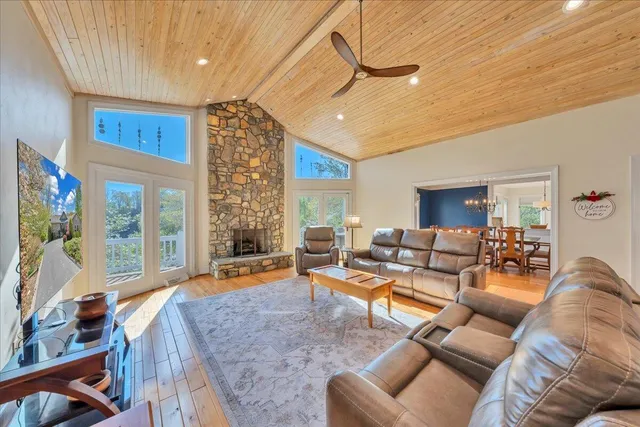 a living room with furniture and a rug
