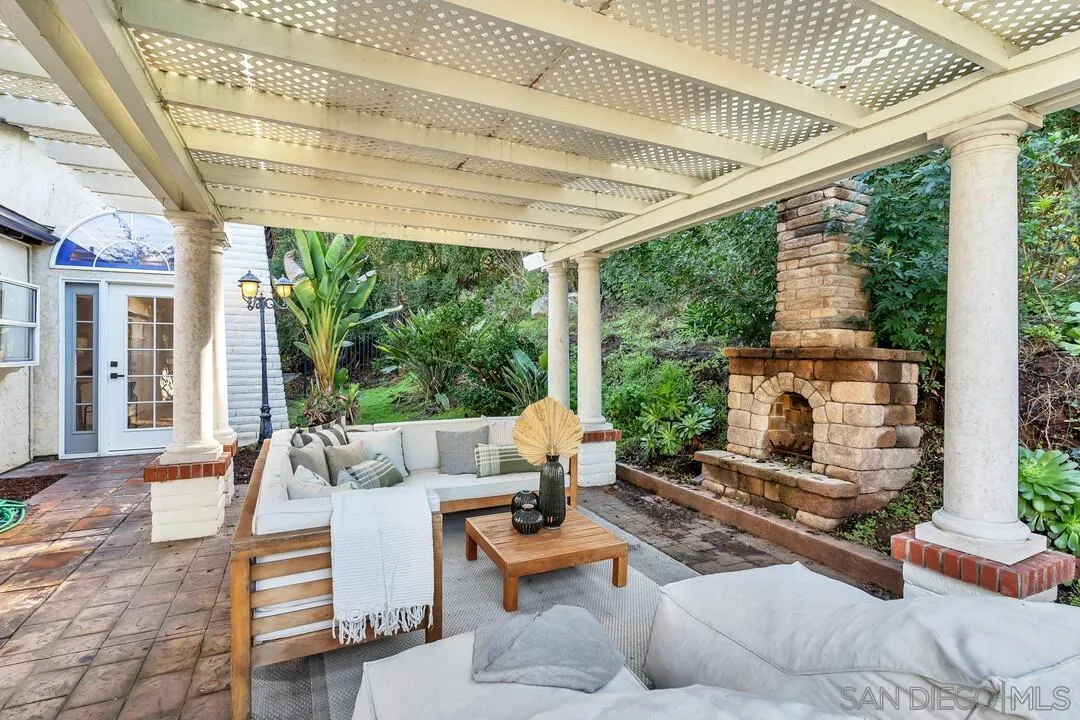 12731 Stone Canyon Road Poway, CA 92064 - Photo 24 of 44 a building outdoor space with patio furniture and potted plants