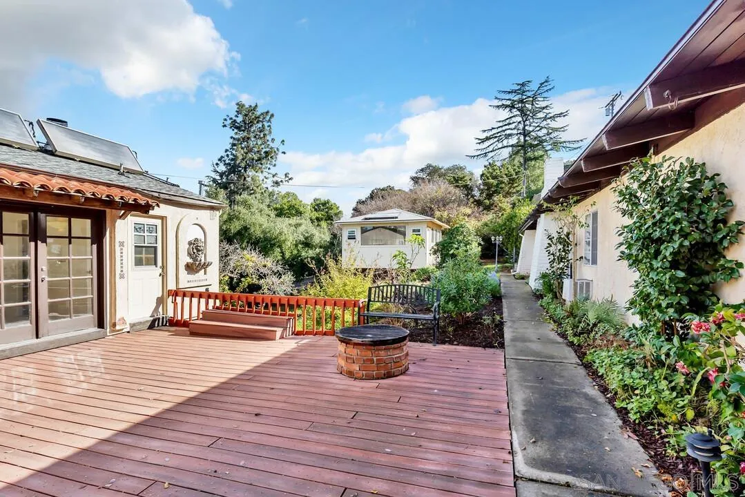 12731 Stone Canyon Road Poway, CA 92064 - Photo 30 of 44 a view of a house with sitting area and garden